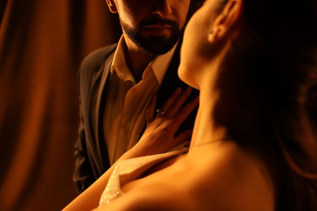 Sensual couple building deeper intimacy in a romantic setting